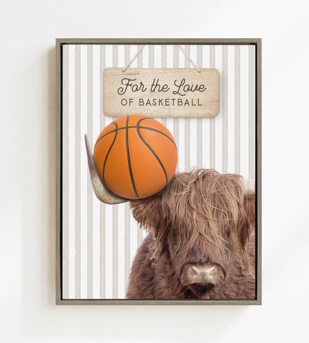 A framed image featuring a Highland cow holding a basketball, with a wooden sign above it that says "For the Love of Basketball".