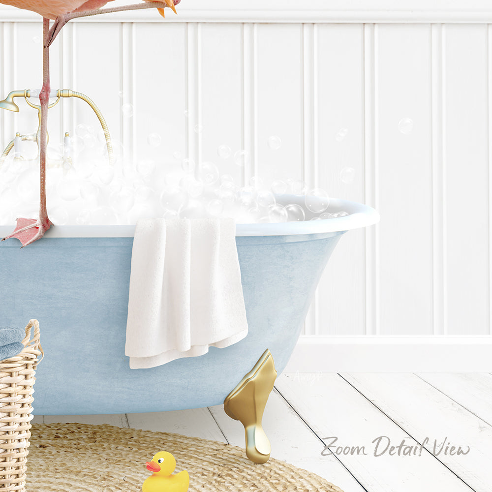 A blue claw-foot bathtub filled with bubbles, with a towel hanging on the side and a rubber duck sitting on the edge of the tub.