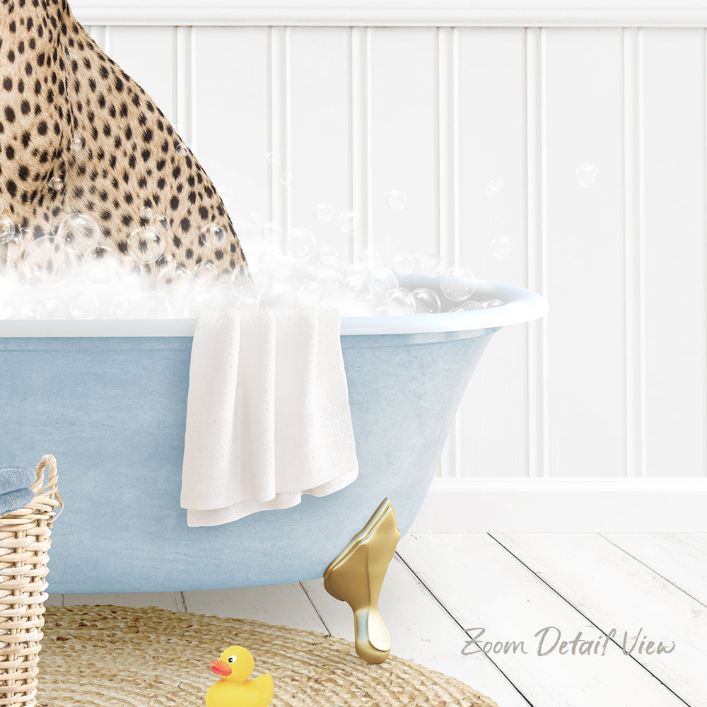 A leopard print towel is hanging on the side of a blue bathtub filled with water, with a rubber duck sitting in the tub.