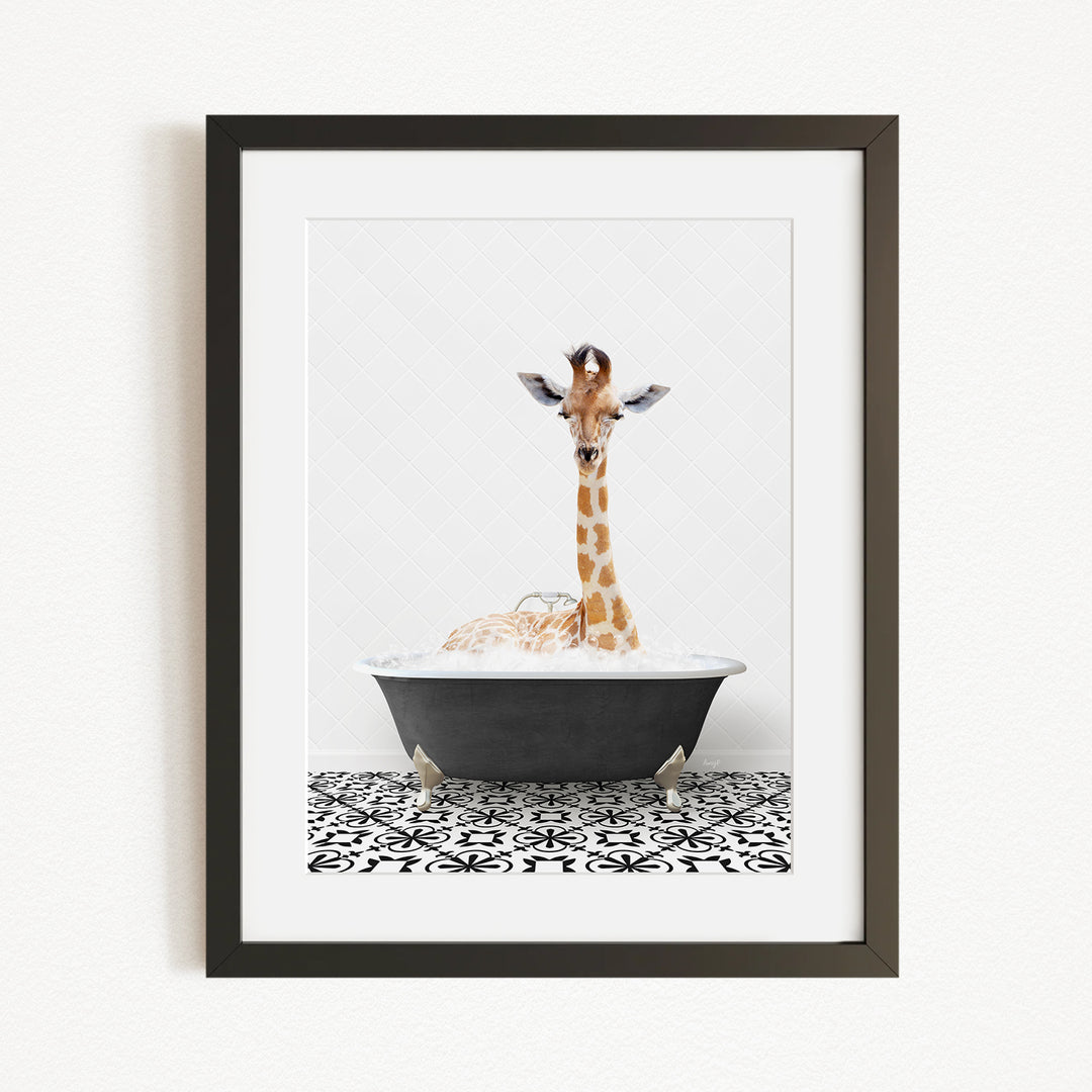 A giraffe is sitting in a bathtub filled with bubbles, creating a whimsical and playful scene.