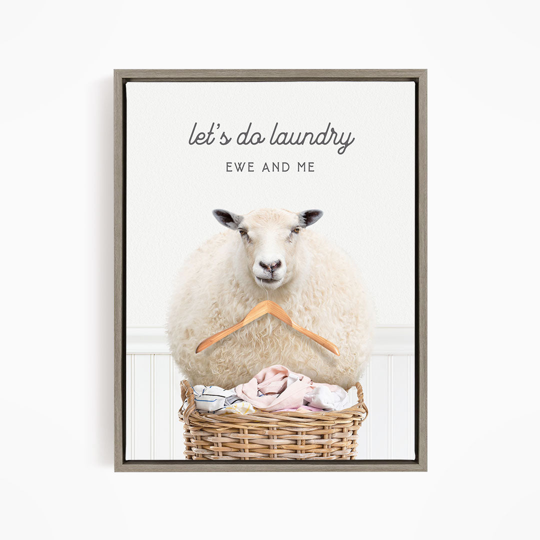 A sheep sitting in a basket filled with laundry, with the text "let's do laundry EWE AND ME" displayed above the image.