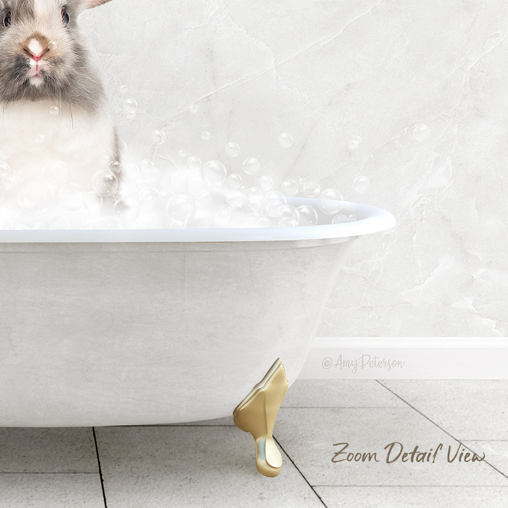 A fluffy white rabbit sitting in a white bathtub filled with bubbles, with a text overlay that reads "Zoom Detail View".