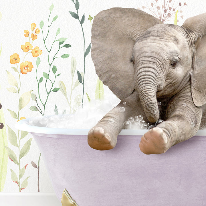 a baby elephant taking a bath in a bathtub