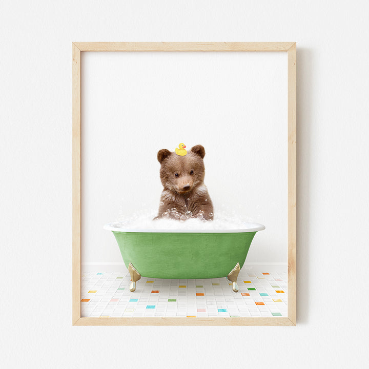 a teddy bear sitting in a green bath tub