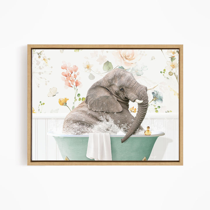 A gray elephant is sitting in a green bathtub filled with water, surrounded by a floral pattern.