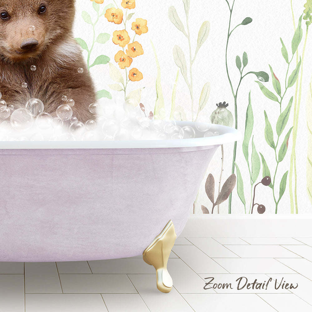 A brown bear is sitting in a pink bathtub filled with bubbles, surrounded by a floral wallpaper.