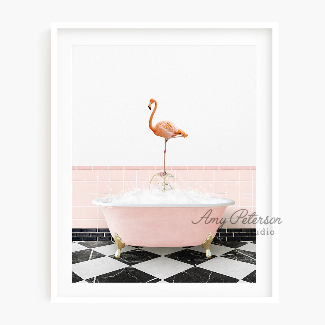 a pink bathtub with a flamingo standing on top of it