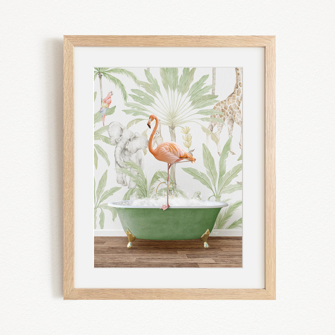 A framed print depicting a pink flamingo standing in a green bathtub, surrounded by tropical foliage and animals, including a giraffe and an elephant.