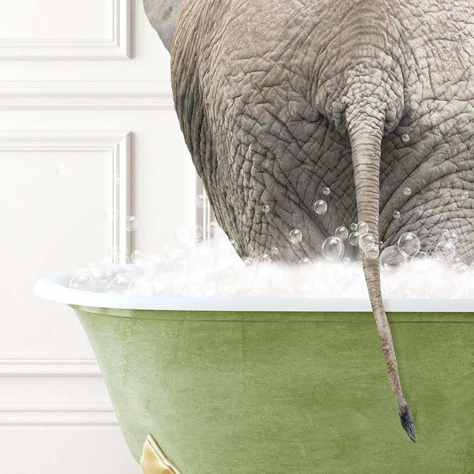 an elephant is taking a bath in a bathtub