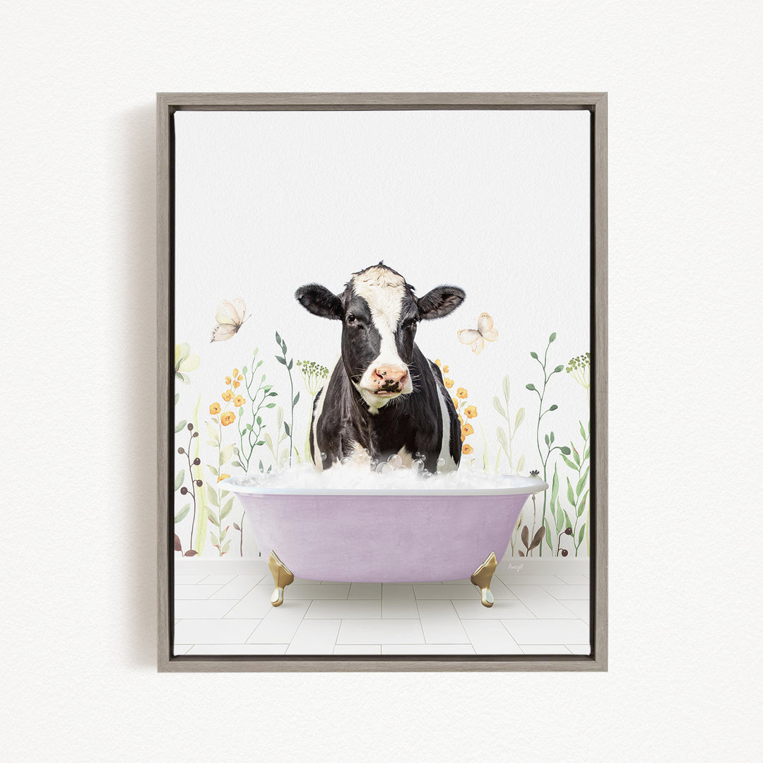 A black and white cow is sitting in a pink bathtub filled with water, surrounded by flowers and butterflies.