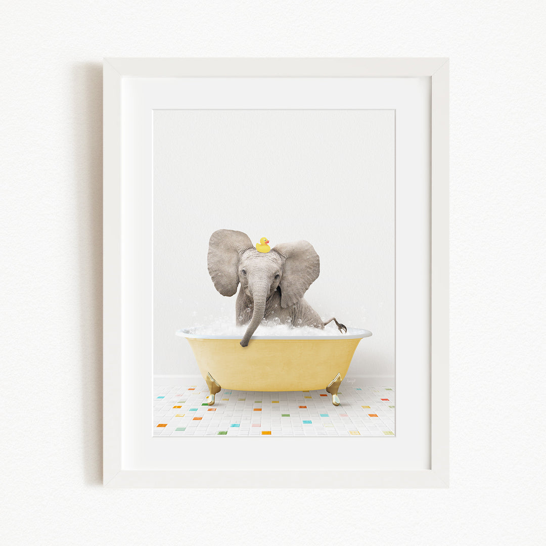 A gray elephant is sitting in a yellow bathtub filled with water, with a yellow rubber duck floating on the water.