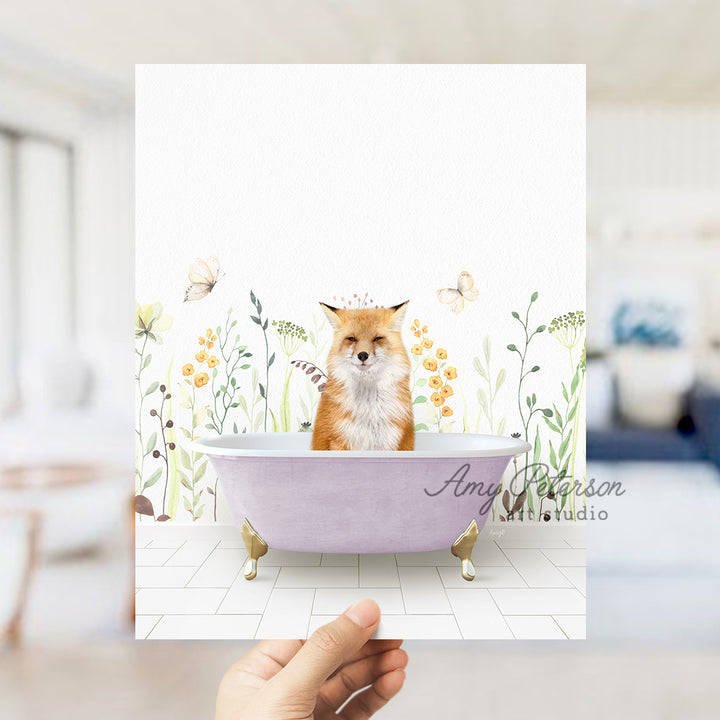 a person holding up a card with a picture of a fox in a bathtub