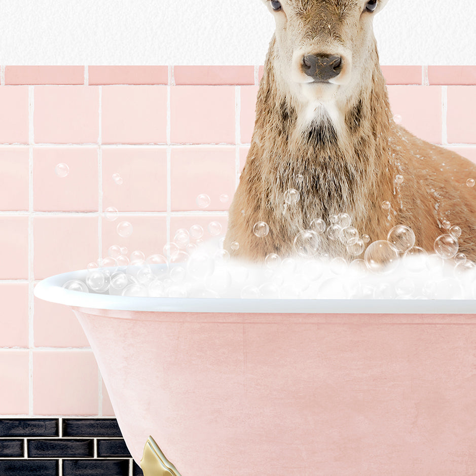 a deer is sitting in a bathtub full of bubbles