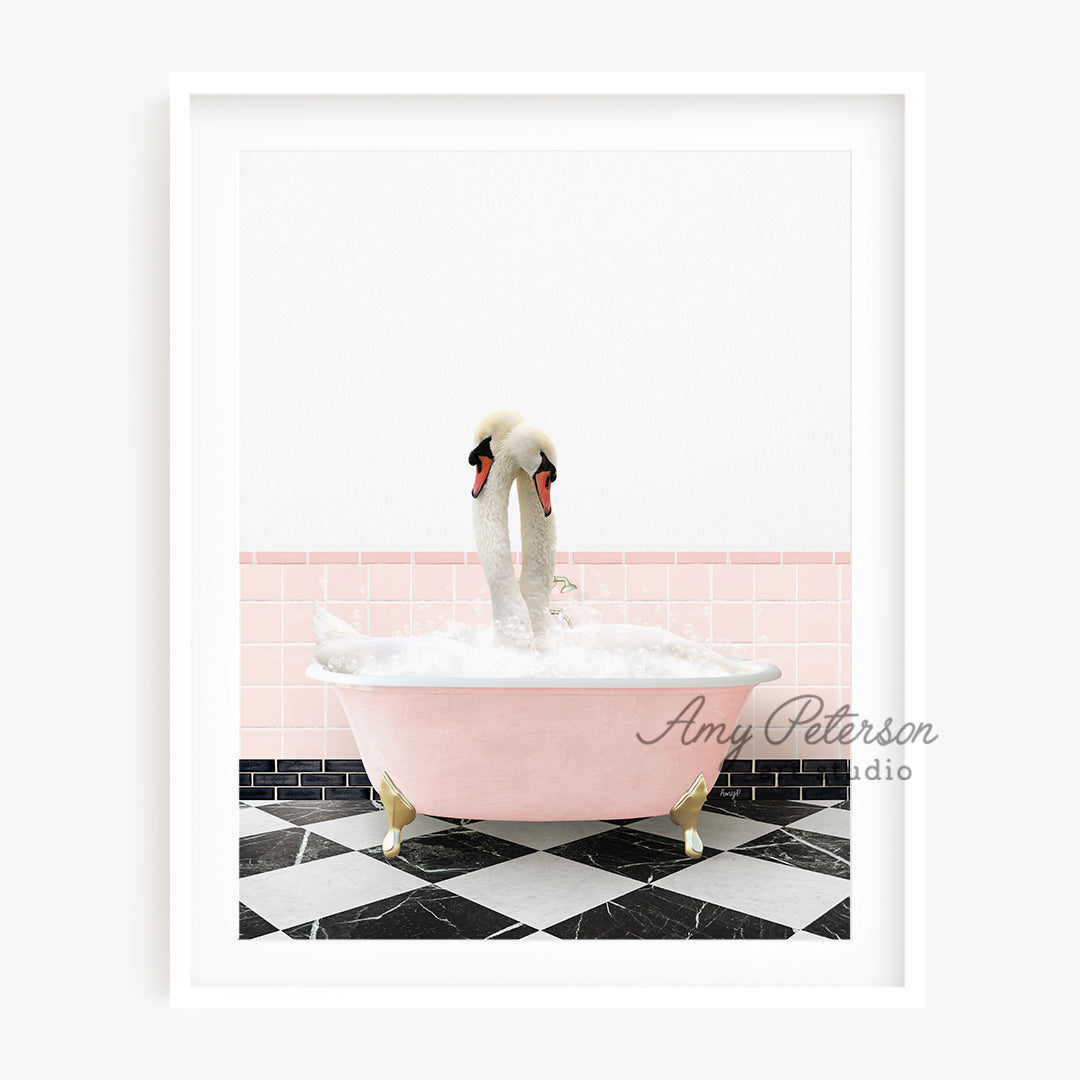 a couple of swans are in a bathtub