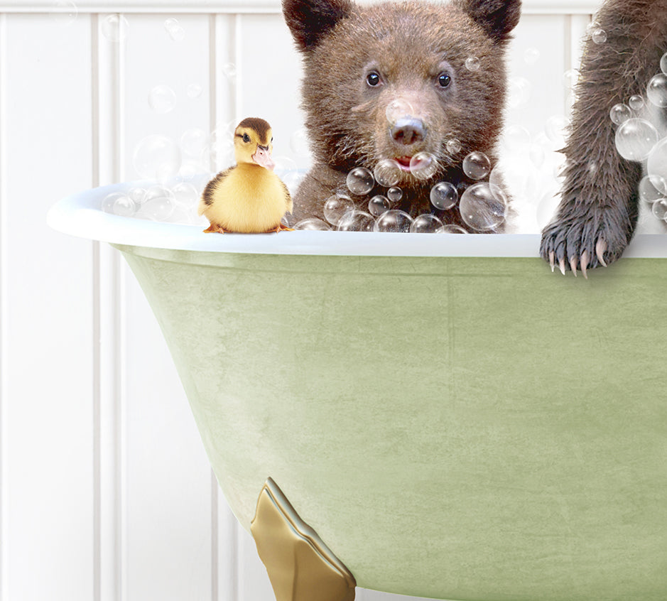 a bear and a rubber duck in a bathtub