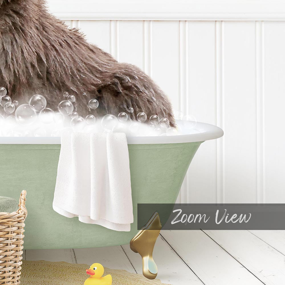 A large, fluffy brown dog is sitting in a green bathtub filled with bubbles, surrounded by a yellow rubber duck and a white towel.