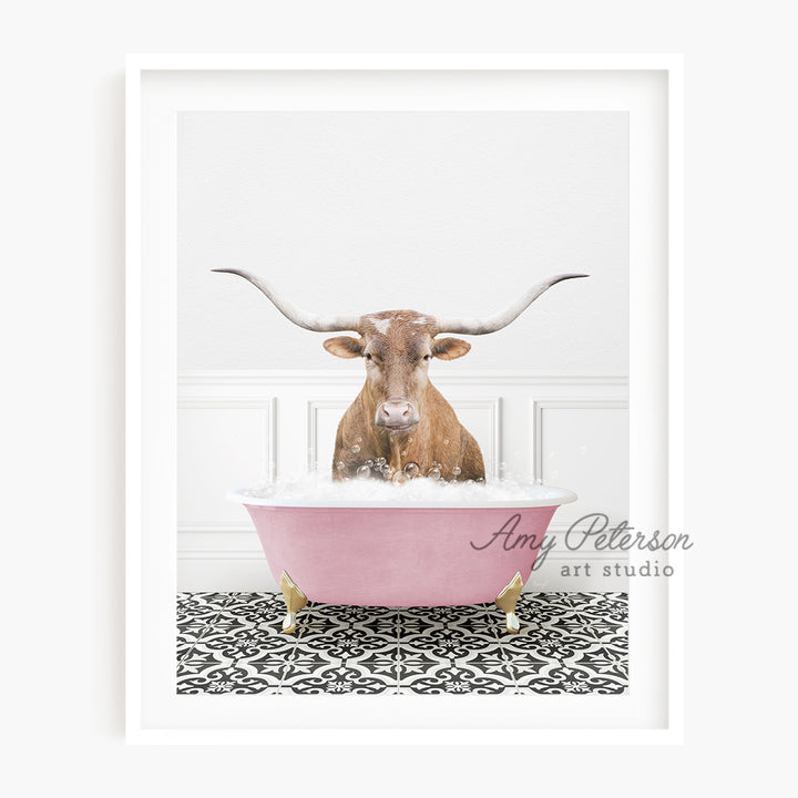 a cow with long horns sitting in a bathtub