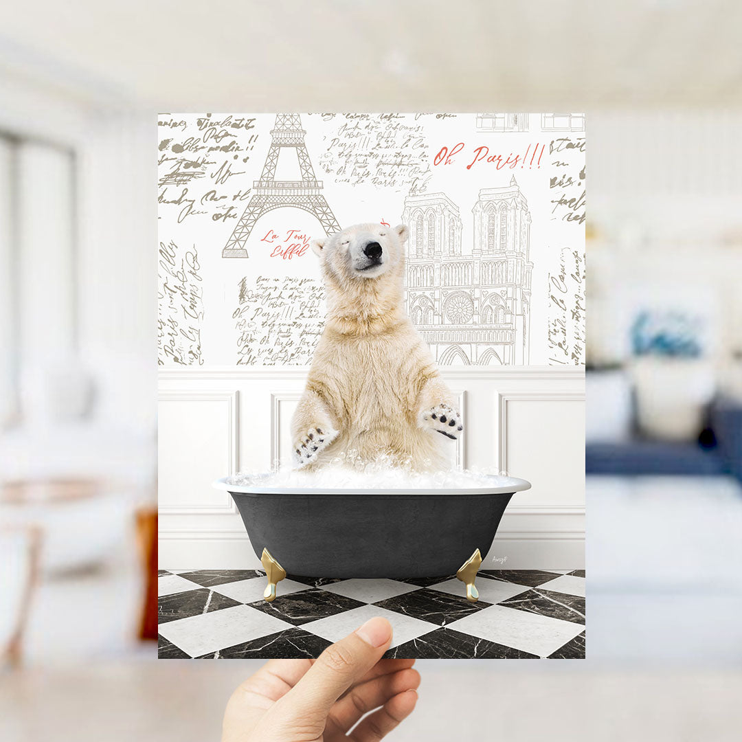 A polar bear sitting in a bathtub filled with water, surrounded by various Paris-themed elements such as the Eiffel Tower and other landmarks.