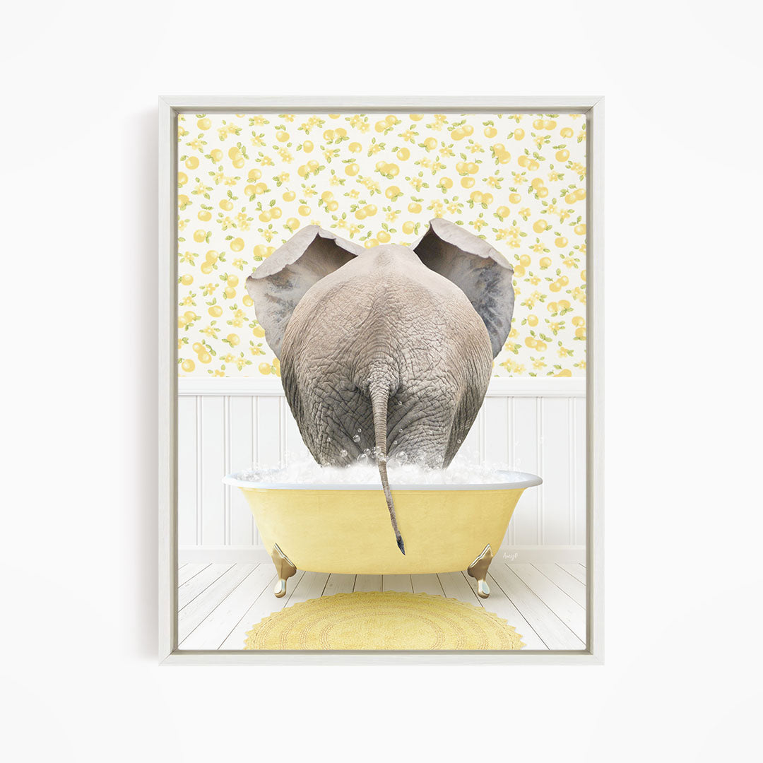 An elephant is taking a bath in a yellow bathtub, surrounded by a yellow and white floral patterned wall.