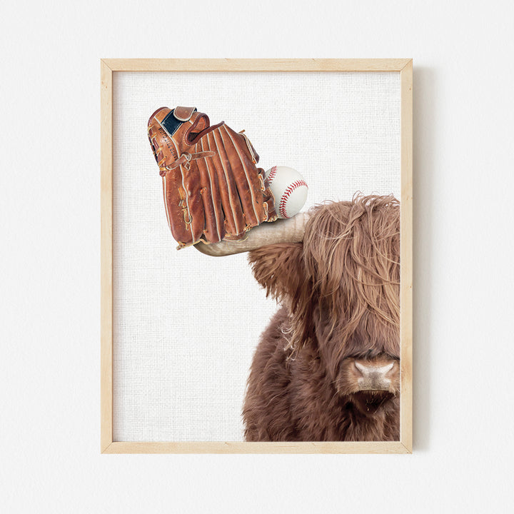 a picture of a bull with a baseball glove on it's head