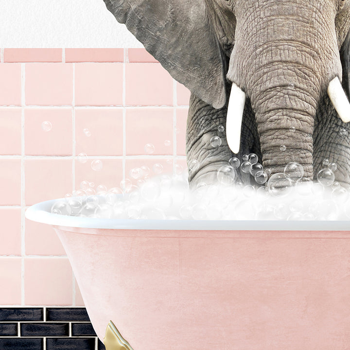 an elephant is taking a bath in a pink bathtub