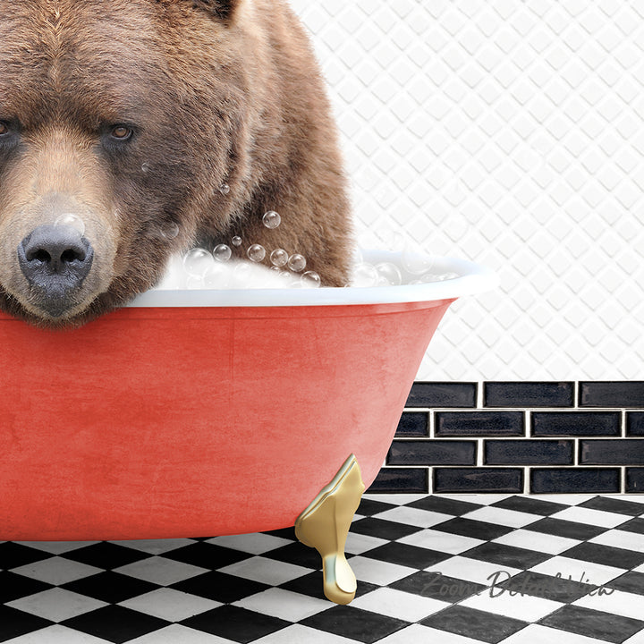 A brown bear is sitting in a red bathtub filled with bubbles, with a black and white checkered floor in the background.