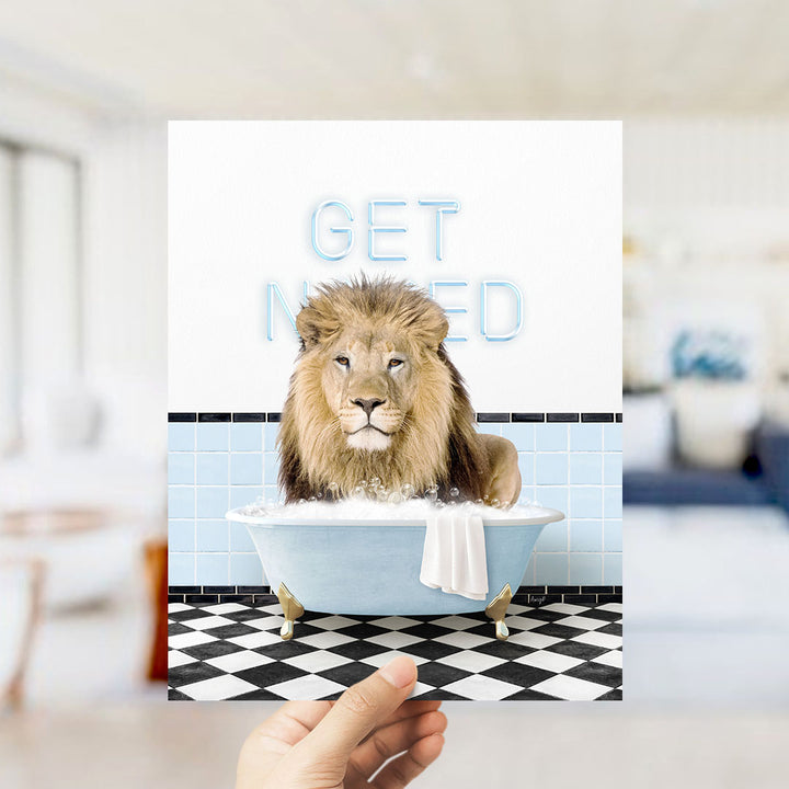 A lion sitting in a bathtub with the words "GET NICKED" written on the wall behind it.