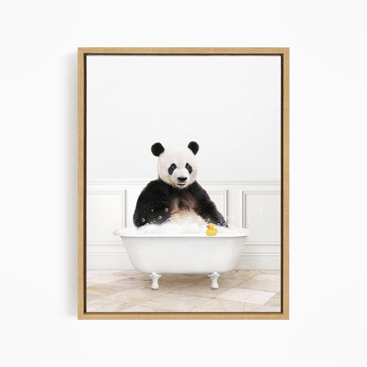 A panda bear sitting in a white bathtub, surrounded by bubbles and a rubber duck.