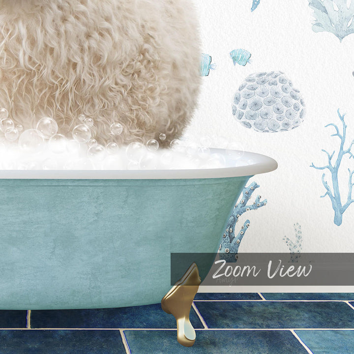 A fluffy white dog is sitting in a blue bathtub filled with bubbles, surrounded by a blue and white underwater scene with coral and fish.