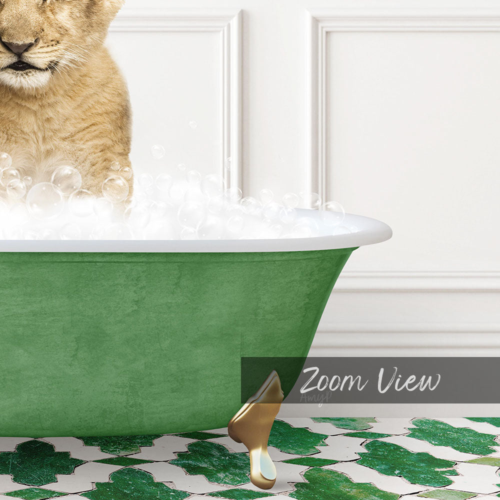 A cat is sitting in a green bathtub filled with bubbles, with a white wall and a patterned tile floor in the background.