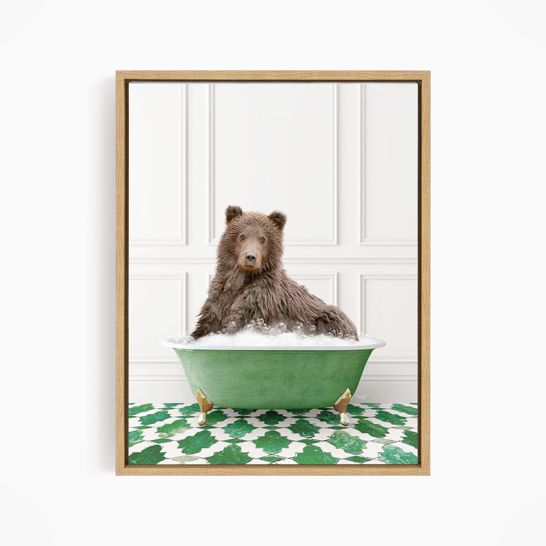 A brown bear sitting in a green bathtub filled with water, surrounded by a green and white patterned floor.