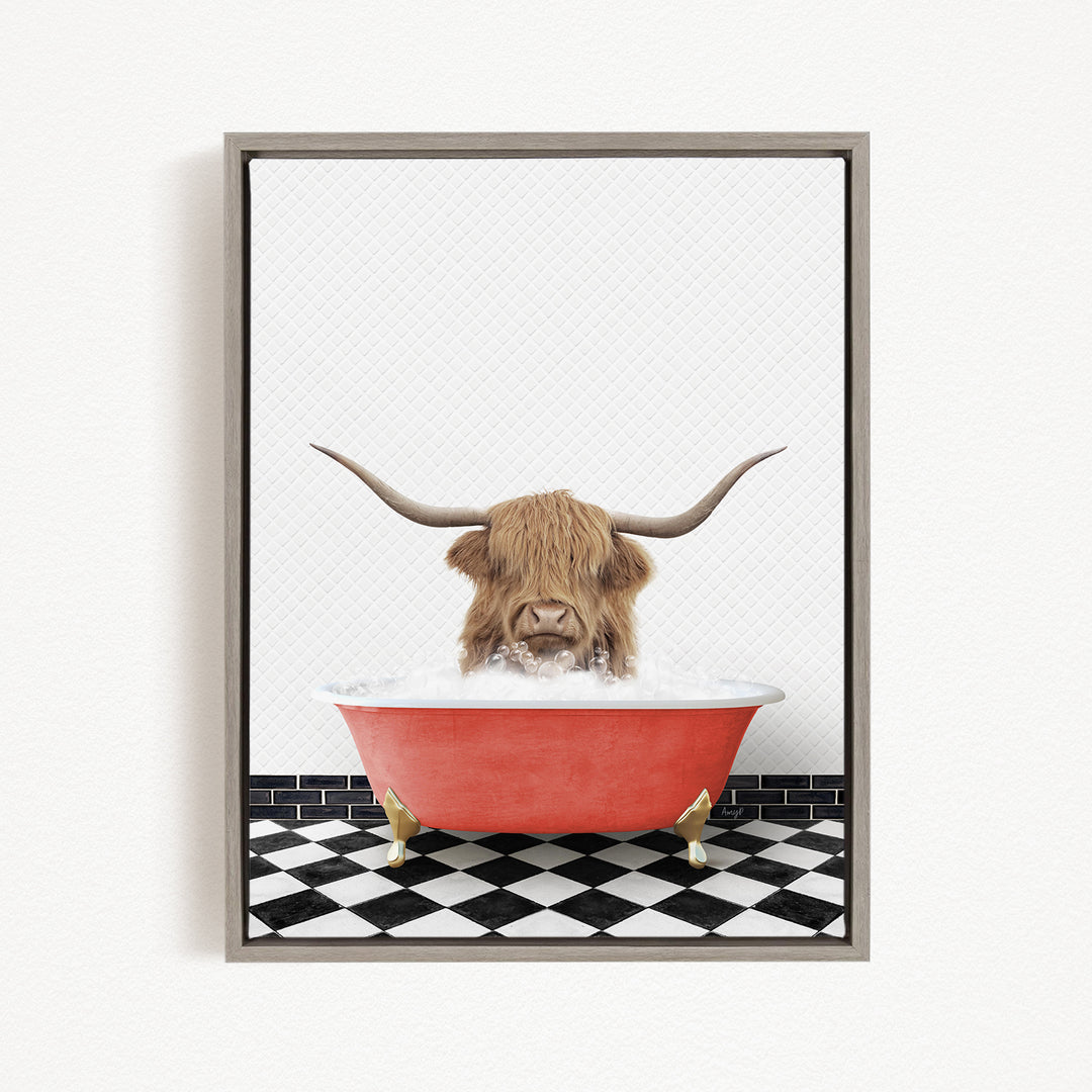 A Highland cow with long horns is sitting in a red bathtub filled with water, creating a whimsical and humorous scene.