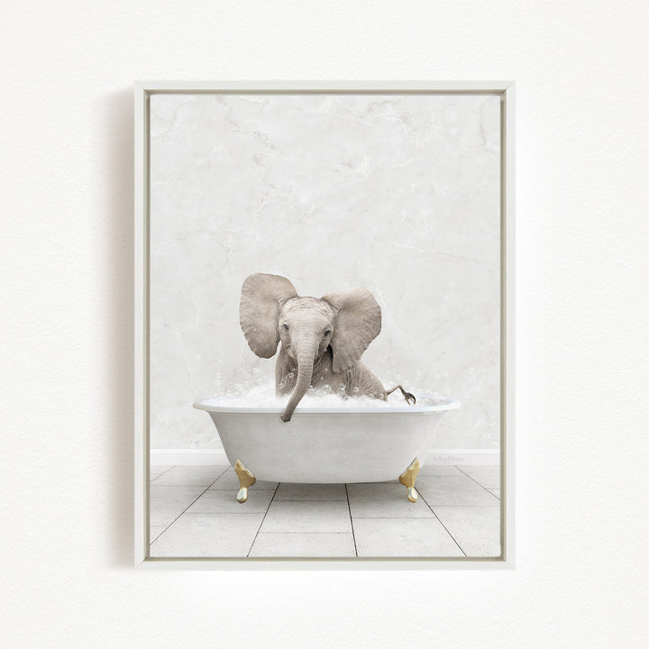 A baby elephant sitting in a white bathtub filled with water, surrounded by a white marble-like background.