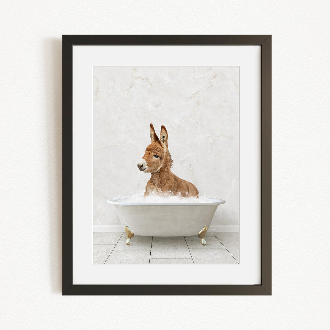 A donkey is sitting in a white bathtub filled with water, creating a playful and whimsical scene.