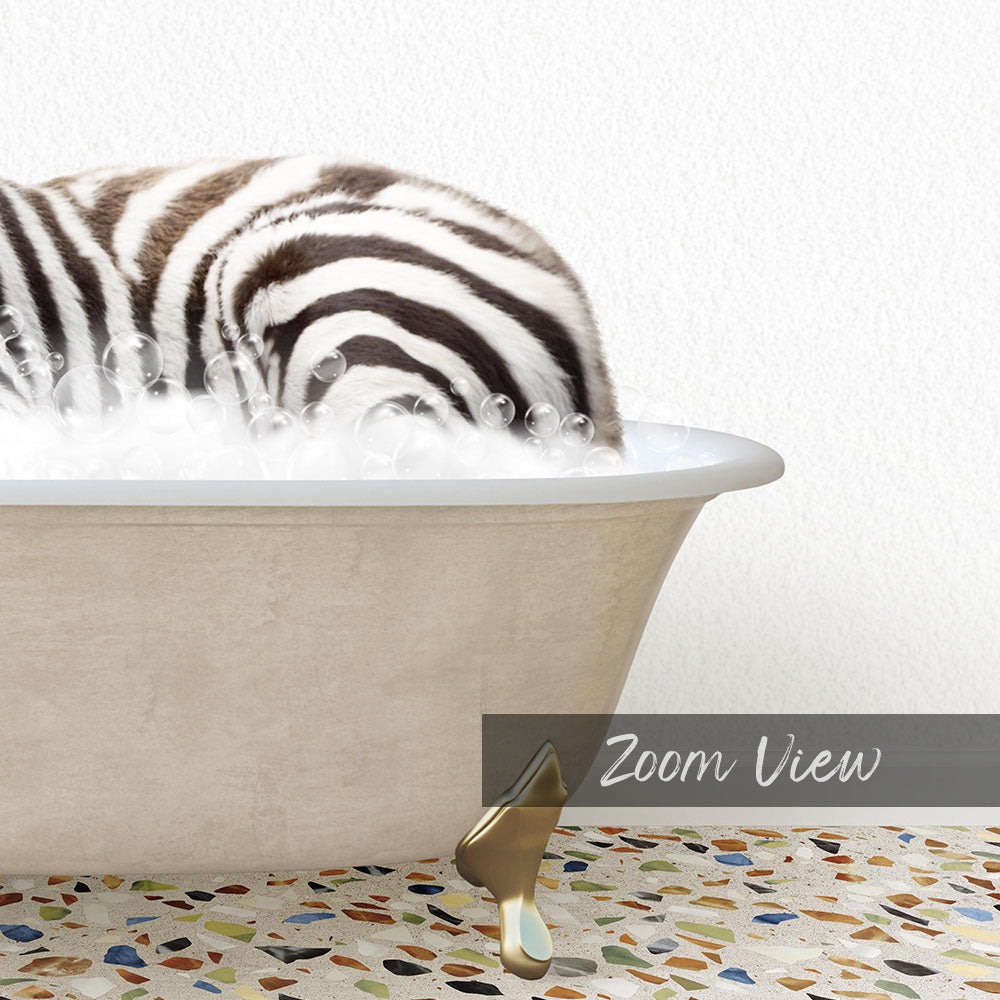 A zebra lying in a bathtub filled with bubbles, with a text overlay that reads "Zoom View".