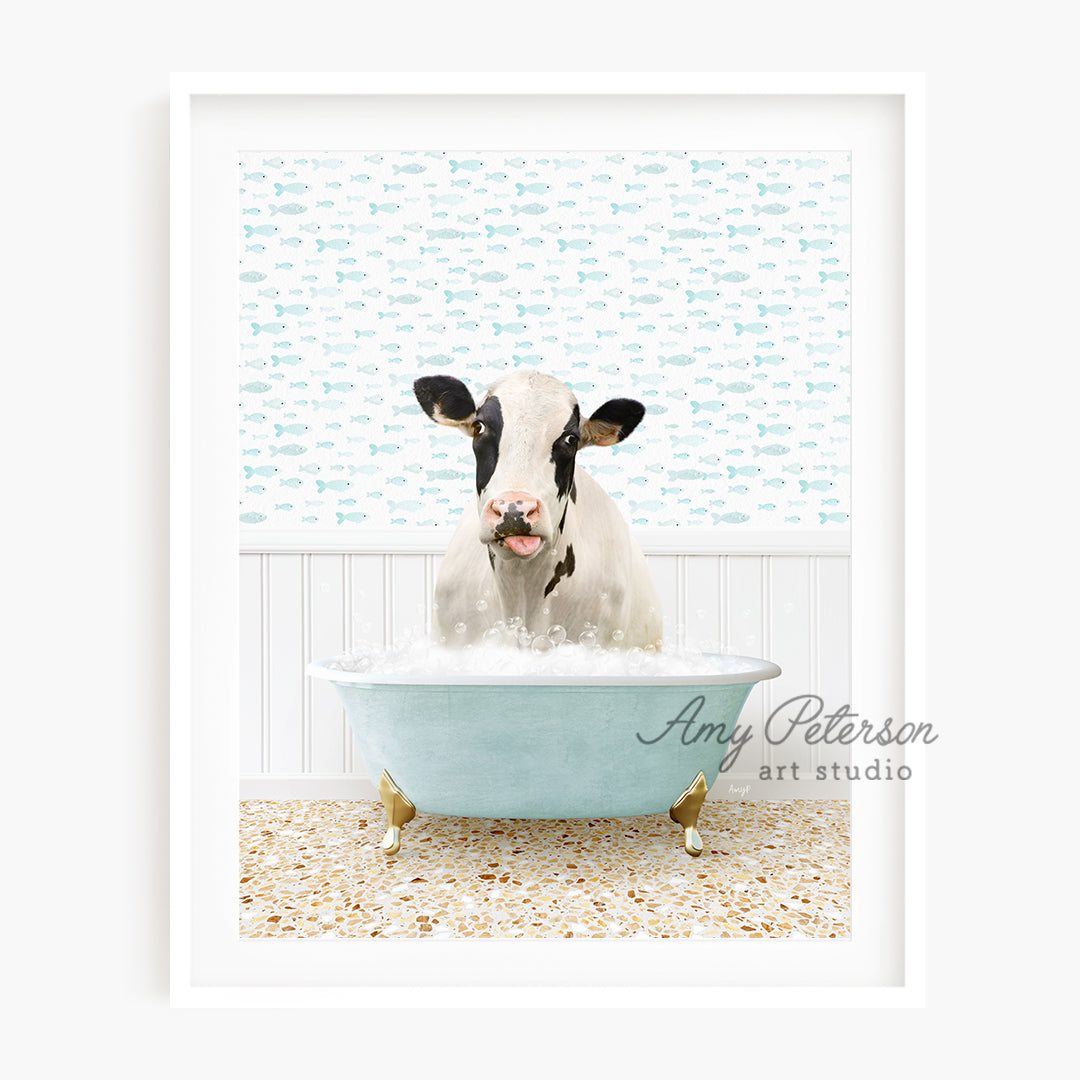 a cow is taking a bath in a blue tub