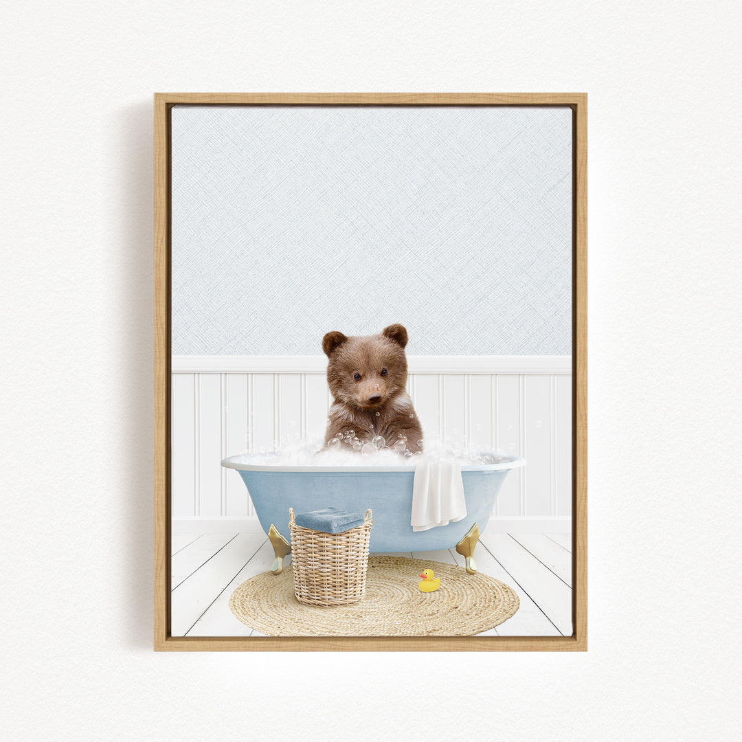 A brown bear sitting in a blue bathtub filled with water, surrounded by a yellow rubber duck and a woven basket.
