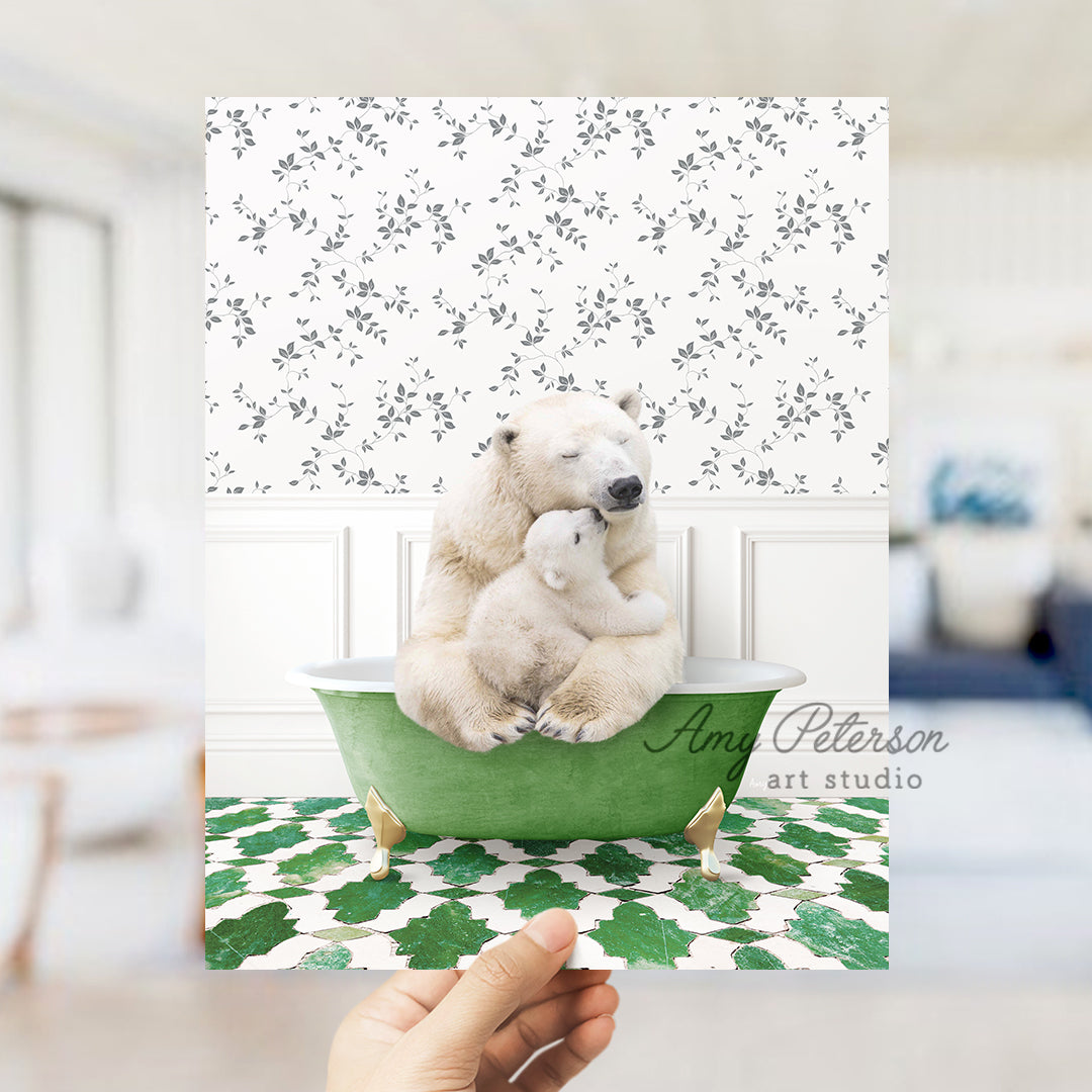 a polar bear and her cub are sitting in a green bathtub