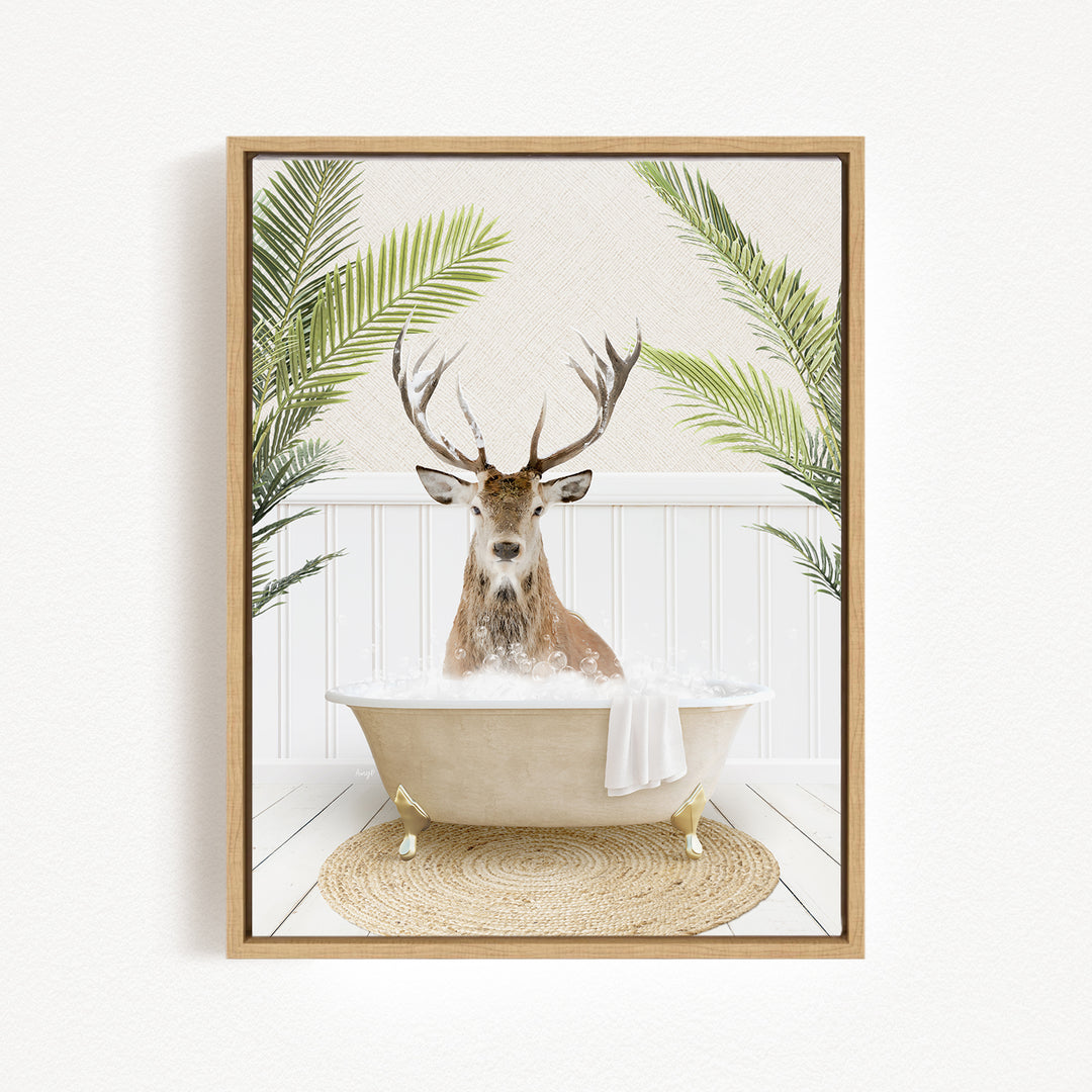 A deer with antlers is sitting in a bathtub filled with water, surrounded by green plants.