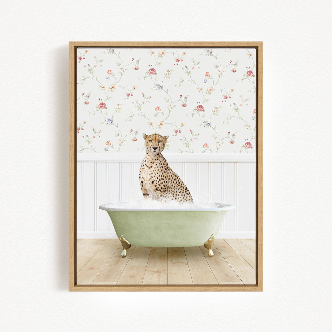 A cheetah sitting in a green bathtub filled with water, with a floral wallpaper in the background.