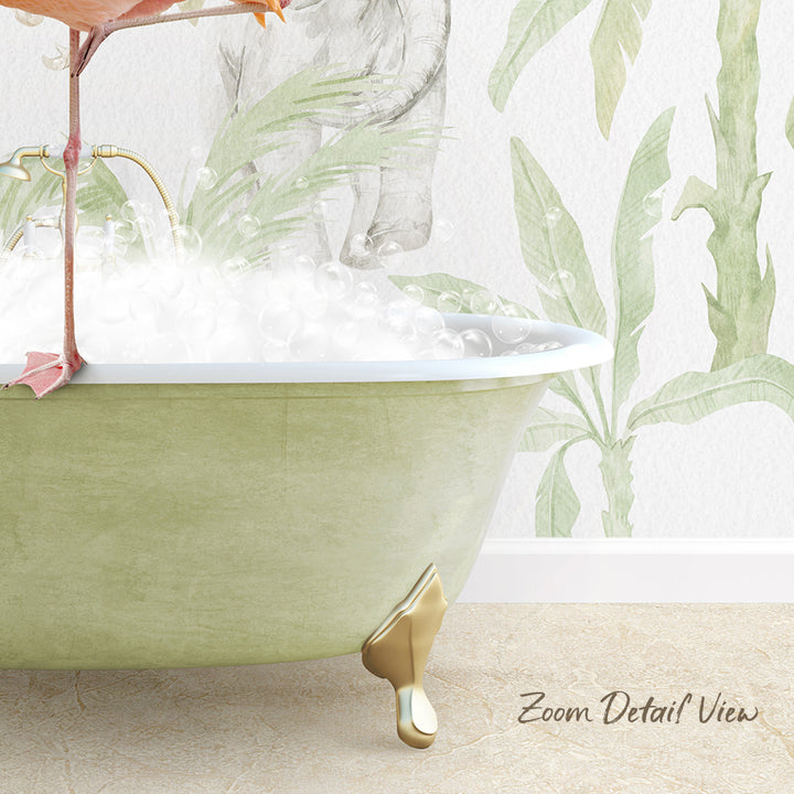 A green clawfoot bathtub filled with bubbles, with a pink flamingo perched on the edge and a wall with a tropical plant mural in the background.