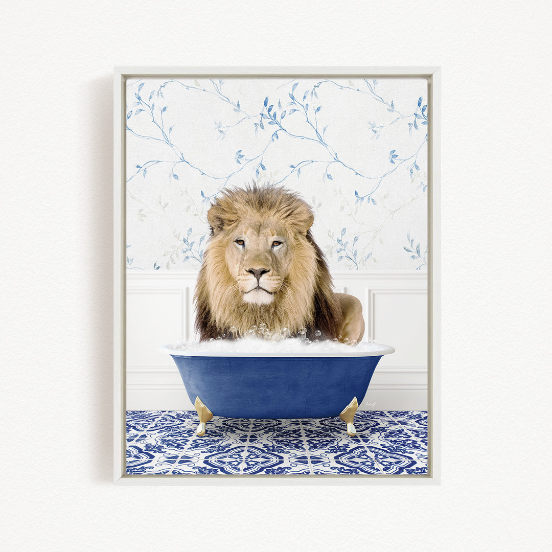 A lion is sitting in a blue bathtub, surrounded by a blue and white patterned rug.