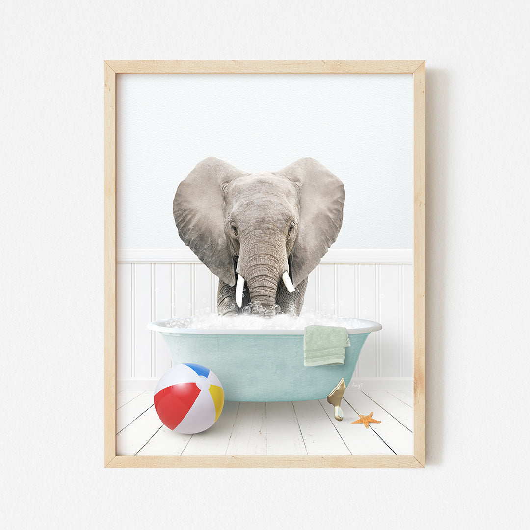 a picture of an elephant taking a bath