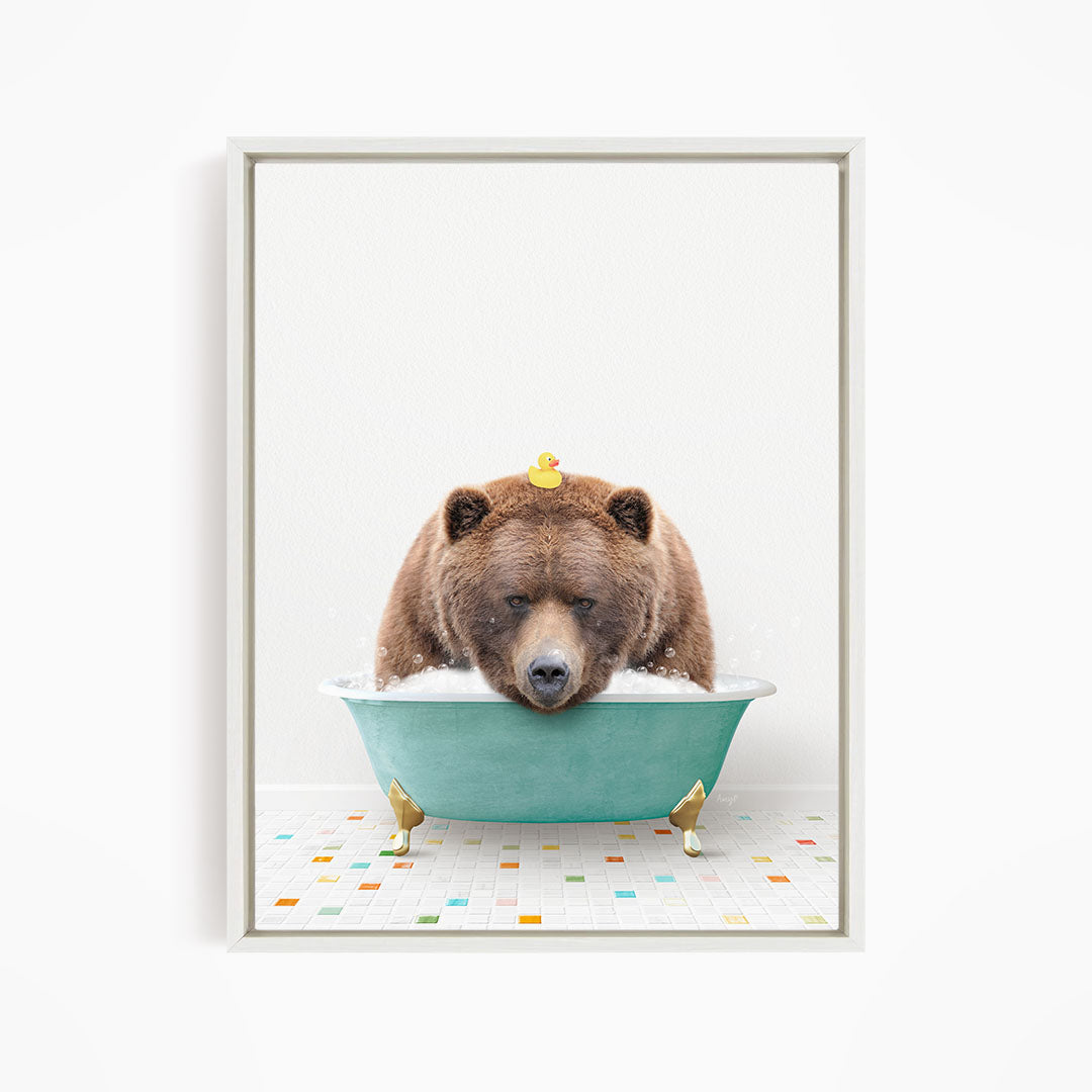 A brown bear is sitting in a green bathtub, surrounded by rubber ducks.