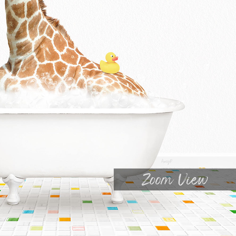 A giraffe is sitting in a white bathtub filled with water, with a yellow rubber duck floating on the water.