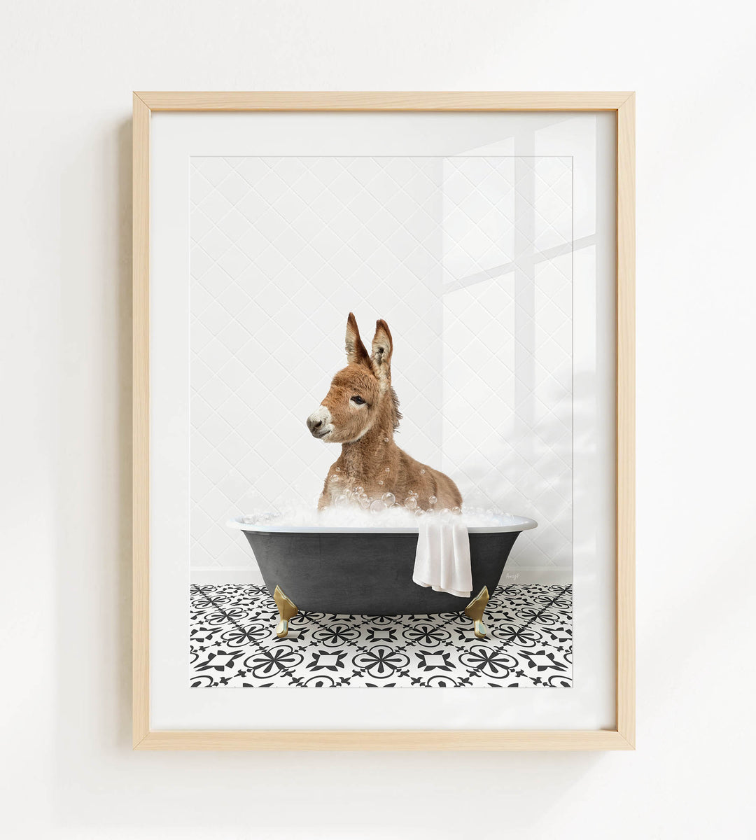 A donkey is sitting in a bathtub filled with water, surrounded by a black and white patterned floor.