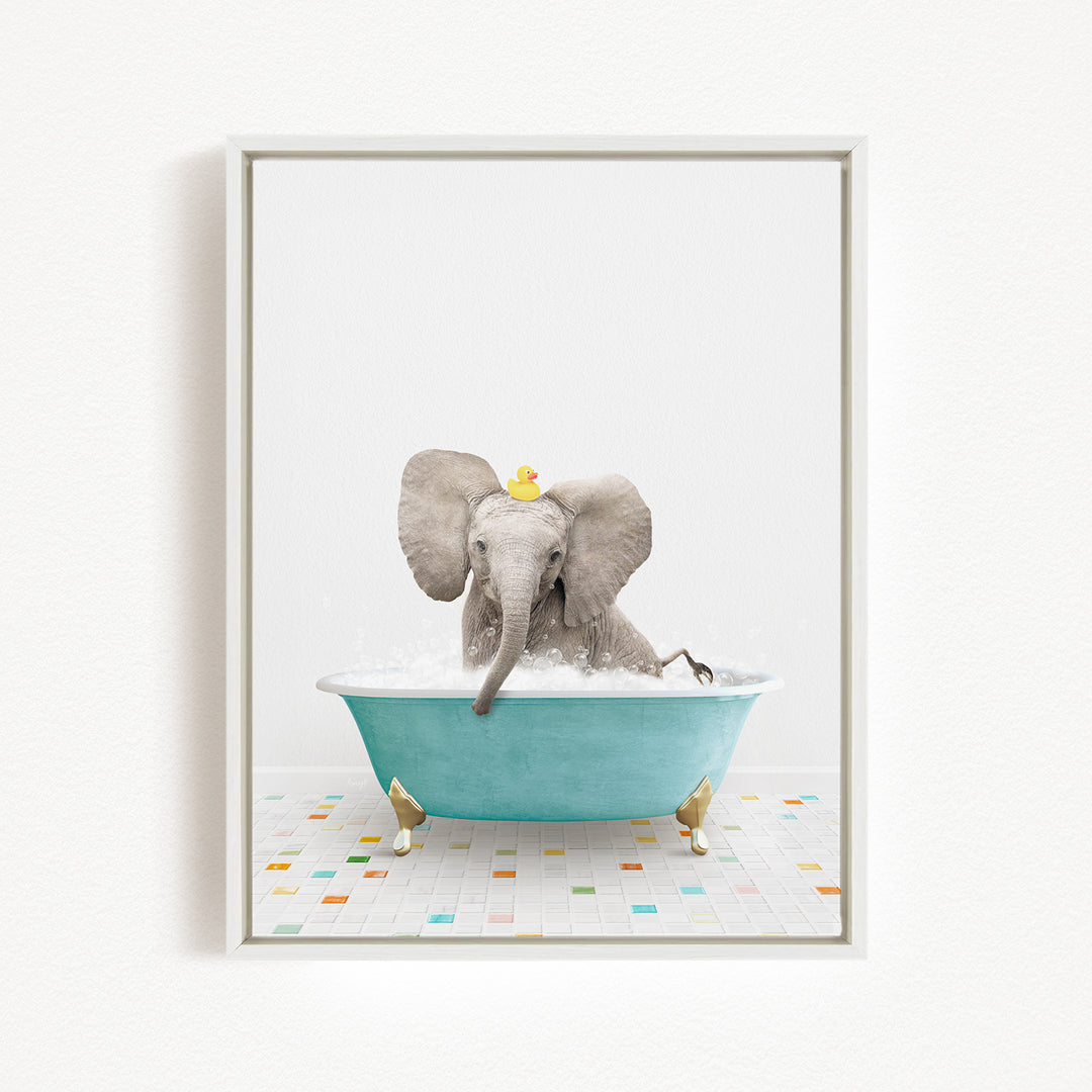 A gray elephant is sitting in a blue bathtub, with a yellow rubber duck perched on its head.