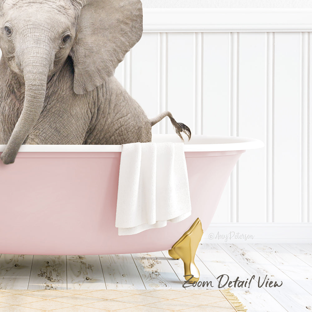 A gray elephant is sitting in a pink bathtub, with a white towel hanging on the side and a gold shoe placed on the floor next to the tub.