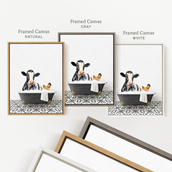 three framed prints of a cow sitting in a bathtub, each with a different colored frame. The cow is depicted in a relaxed and playful manner, surrounded by a towel and a chicken. The framed prints are arranged in a row, showcasing the cow in various colored frames.