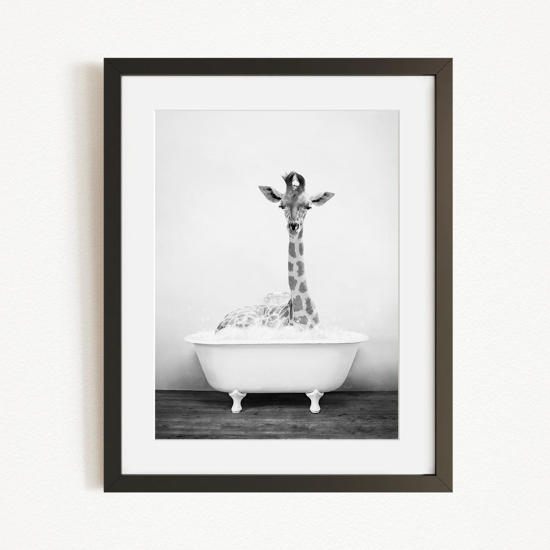 A giraffe standing in a white bathtub filled with water, creating a whimsical and playful scene.